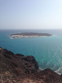 Scenic view of sea against clear sky