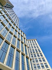 Low angle view of modern building against sky