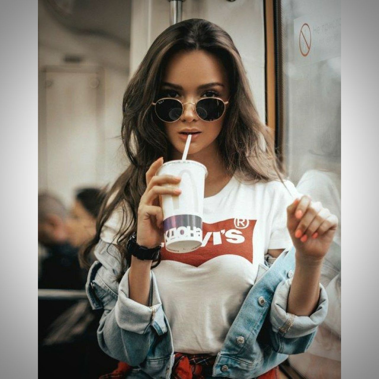 glasses, front view, young adult, one person, sunglasses, young women, waist up, fashion, holding, lifestyles, portrait, real people, food and drink, indoors, looking at camera, hairstyle, women, drink, long hair, casual clothing, hair, drinking, beautiful woman