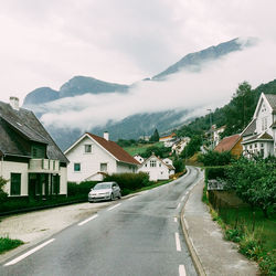 Country road leading towards mountains