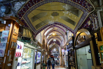 Low angle view of illuminated ceiling of building