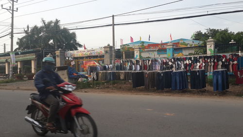 Man riding bicycle on road
