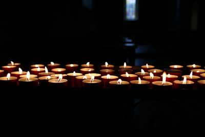 Row of candles in temple