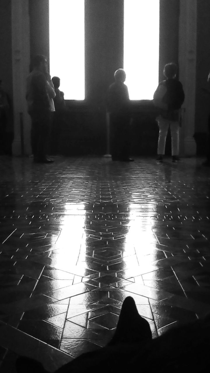 architecture, real people, indoors, flooring, building, built structure, place of worship, religion, group of people, spirituality, history, incidental people, people, belief, men, the past, silhouette, art and craft, tiled floor, architectural column