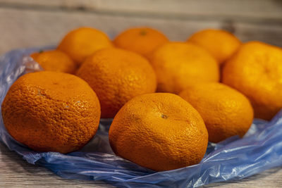 Close-up of oranges on table