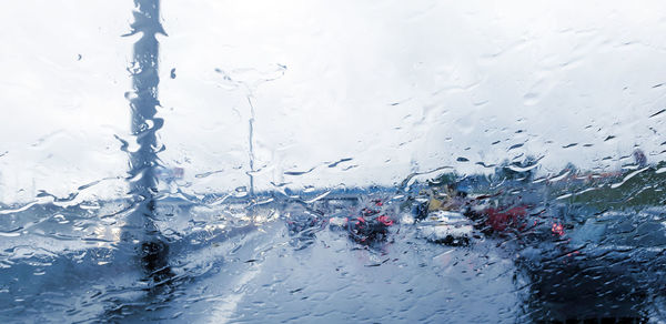 Wet glass window in rainy season