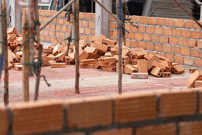 Stack of wood at construction site