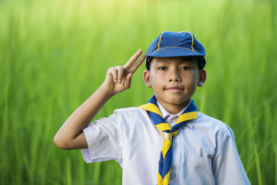 Portrait of boy standing outdoors