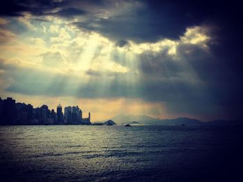 Scenic view of sea against cloudy sky