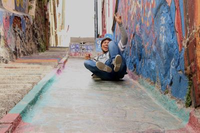 Portrait of smiling man sitting on water