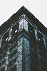 Low angle view of modern building against clear sky