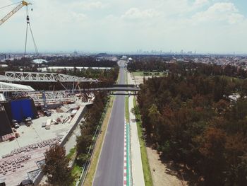 High angle view of city street against sky