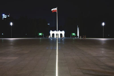 Illuminated street lights at night