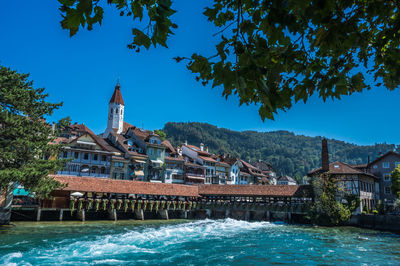 Bridge over river against sky