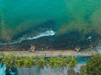 High angle view of swimming pool by sea