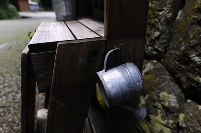 Close-up of metal container on rock