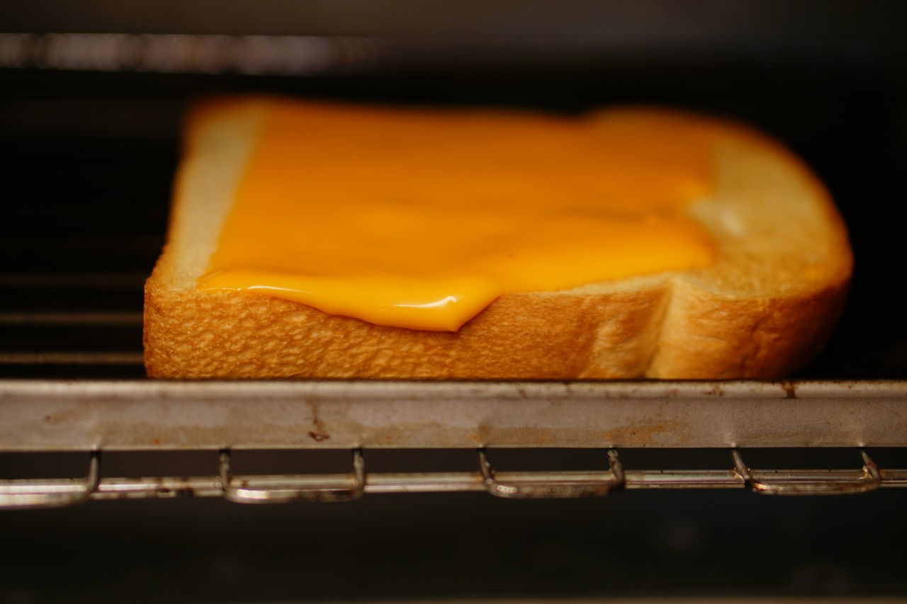food, food and drink, freshness, indoors, bread, baked, no people, close-up, breakfast, dessert, meal, yellow, appliance, fast food, healthy eating, dish, wellbeing, cheddar cheese, produce, heat, selective focus