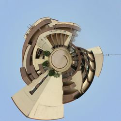 Low angle view of clock tower against clear sky