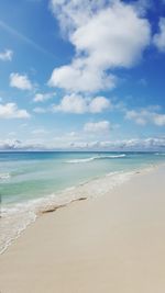 Scenic view of beach against sky