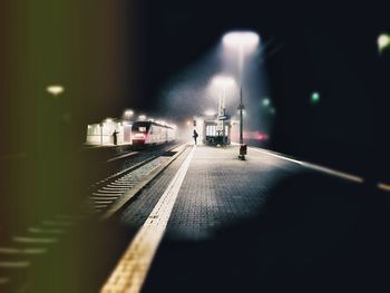 Illuminated street lights at night