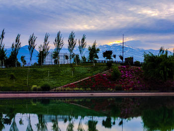 Scenic view of lake against sky during sunset