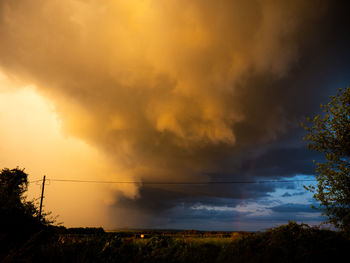 Scenic view of dramatic sky during sunset