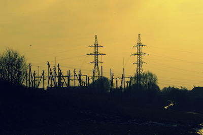 Silhouette of trees against sky during sunset