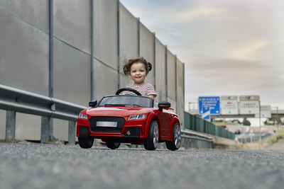 Portrait of boy in car