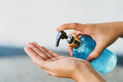 Close-up of person washing hands