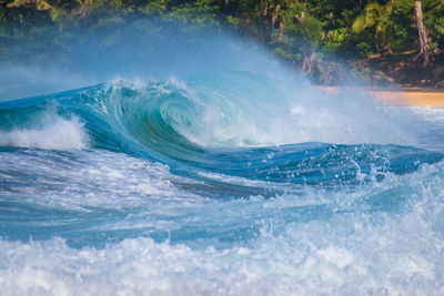 Sea waves splashing in swimming pool