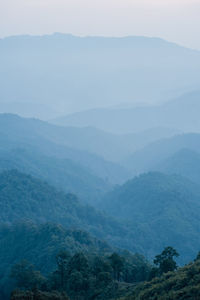 Wide view layer of mountain with sunrise background