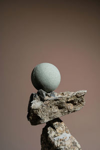 Close-up of stone against wall