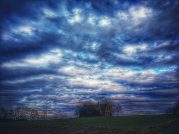 View of storm clouds over landscape