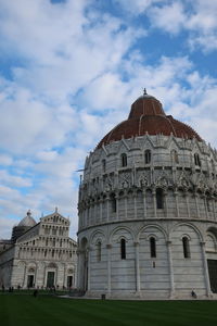 Low angle view of cathedral against cloudy sky