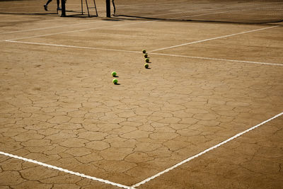 Tennis balls on playing field