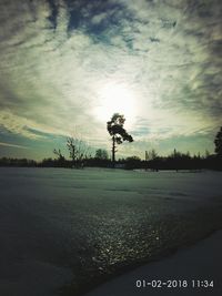 Scenic view of landscape against sky during sunset