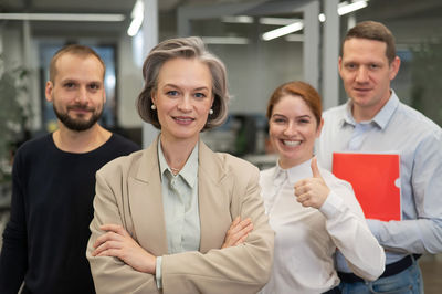 Portrait of business colleagues working in office