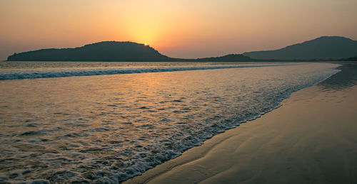 Scenic view of sea against sky during sunset