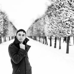 Portrait of young woman in snow