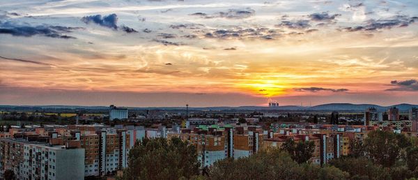 High angle view of townscape against sky during sunset