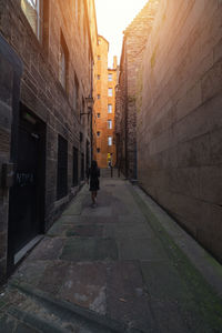 Narrow alley along buildings