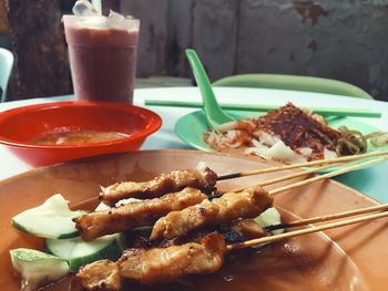 Close-up of food served on table