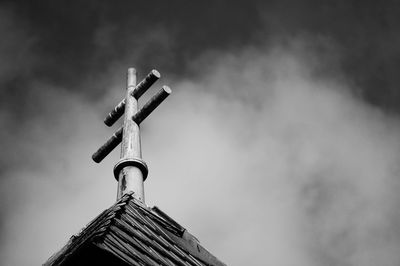 Low angle view of statue against sky