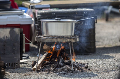 Close-up of food being cooked in pan at campsite