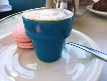 Close-up of coffee cup on table