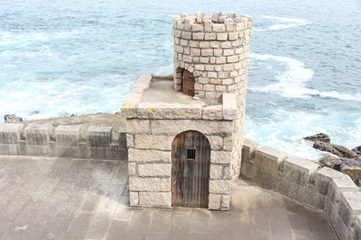 Old built structure by the sea
