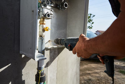 Low section of man working at construction site