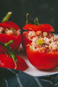 Close-up of red chili peppers on table