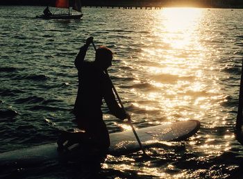 Reflection of people in water