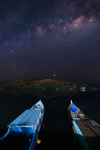 Scenic view of sea against sky at night